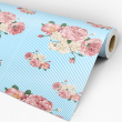 Wallpaper with Floral Roses on a Blue Background.