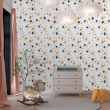 Jugendliche Tapete mit goldenen Sternen