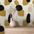 Papier peint abstrait motif formes organiques noir et moutarde