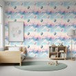 Papier peint baby Montgolfières motif nuages fond multicolore