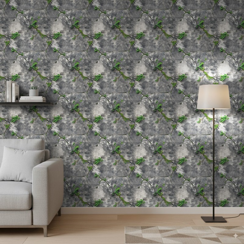 Papier peint béton modèle Green Crack design naturel avec mousse et feuilles vertes sur ciment gris