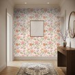 Carta da parati floreale design romantico fiori rosa, lilla e pesca sfondo beige chiaro