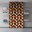 Papel pintado geométrico semicírculos diseño moderno tonos naranja, amarillo y negro
