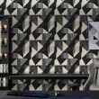 Geometric wallpaper triangles modern minimalist design grey and black tones