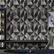 Papier peint géométrique triangles motif moderne effet dégradé tons gris et noir